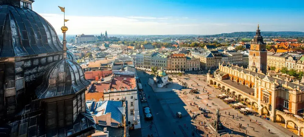 Aerial view of Krakow's historic Main Market Square showcasing medieval architecture and vibrant city center