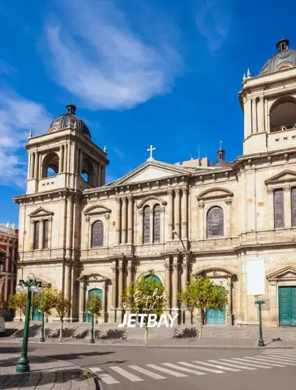 Historic colonial cathedral with twin bell towers and ornate baroque facade in La Paz Bolivia under blue sky