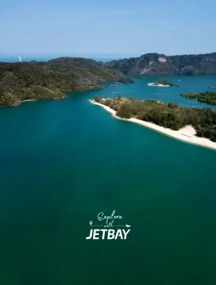 Pristine turquoise waters surround lush tropical islands in Langkawi, Malaysia's premier luxury travel destination