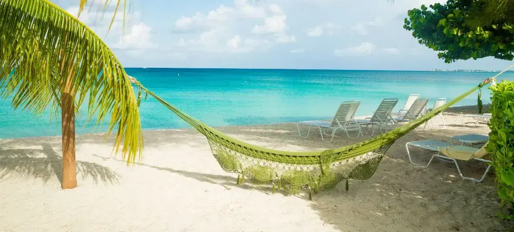 Local cuisine and dining scene in Seven Mile Beach popular with private jet charter passengers