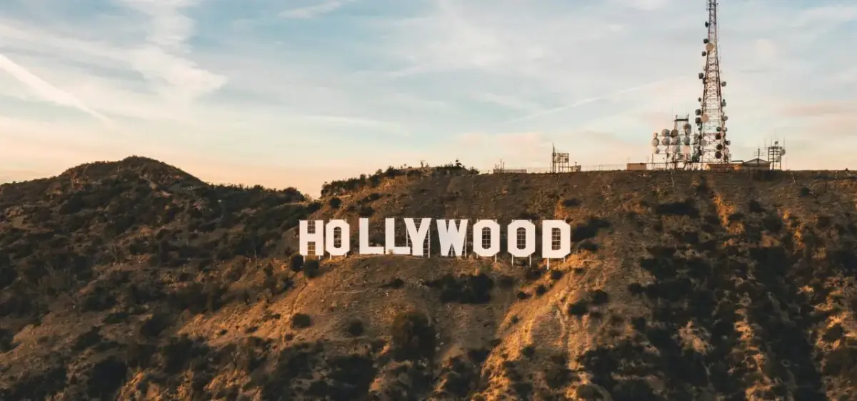 Hollywood sign on hillside at golden hour showcasing Los Angeles as premier private jet destination