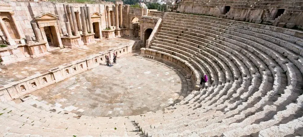 Ancient Roman amphitheater in Lyon showcasing well-preserved stone seating and classical architecture