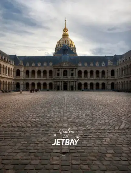 Historic Les Invalides courtyard in Paris showcasing French baroque architecture for luxury travel