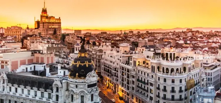 Madrid cityscape at golden hour showcasing historic architecture and vibrant Spanish capital skyline