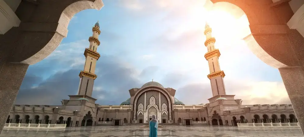 Majestic mosque with twin minarets in Malaysia showcasing Islamic architecture and cultural heritage