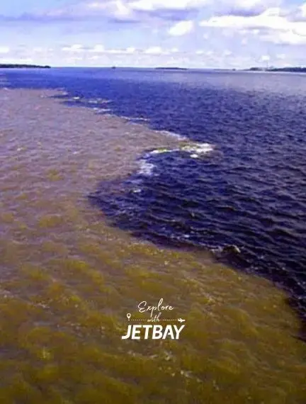 Meeting of Waters phenomenon where Amazon and Rio Negro rivers converge near Manaus with Jetbay branding