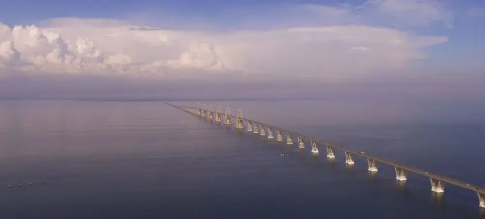 Aerial view of General Rafael Urdaneta Bridge spanning Lake Maracaibo in Venezuela at golden hour