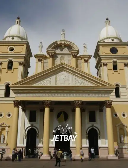 Historic colonial cathedral with twin bell towers and neoclassical facade in Maracaibo's city center