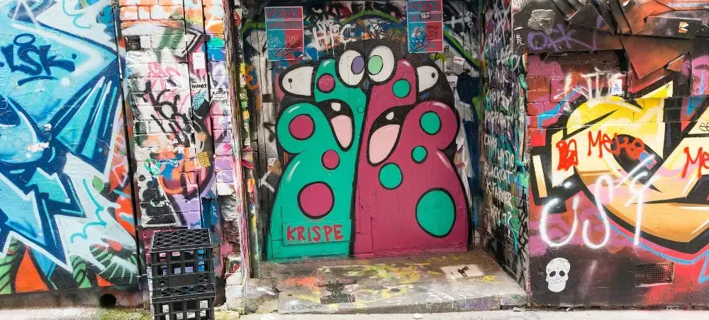 Vibrant street art and colorful graffiti murals in Melbourne's famous laneways showcase the city's creative culture