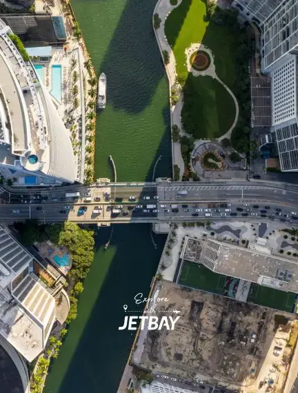 Aerial view of Miami's downtown skyline and Chicago River with bridges connecting urban districts