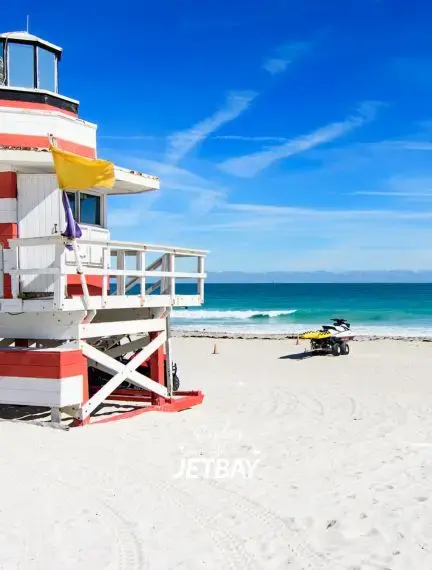 Iconic Art Deco lifeguard station on Miami Beach with turquoise waters and pristine white sand