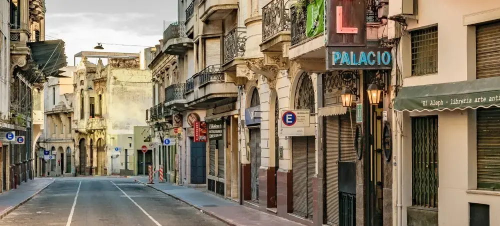 Historic colonial street in Montevideo with traditional architecture and colorful building facades