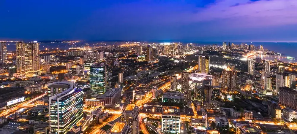Illuminated Mumbai skyline at dusk showcasing India's modern urban landscape and luxury travel destination