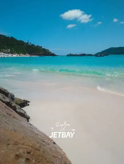 Pristine white sand beach with crystal clear turquoise waters in Nassau, Bahamas for luxury travel
