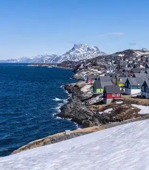 Nuuk skyline and landmark attractions seen on descent during a private jet charter approach