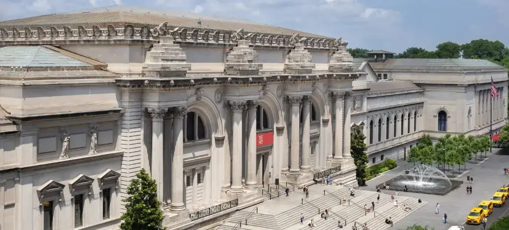Metropolitan Museum of Art's grand neoclassical facade with iconic columns and steps in New York City