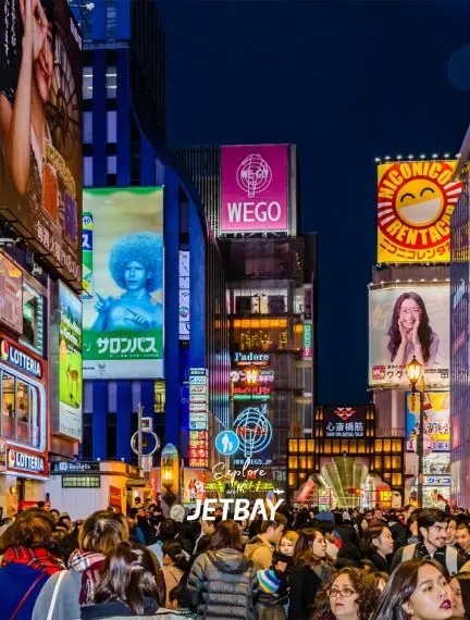 Bustling Osaka nightlife district with neon signs and crowds exploring vibrant entertainment quarter