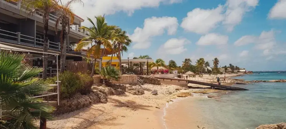 Outdoor market and shopping district in Oranjestad visited by private jet charter travellers