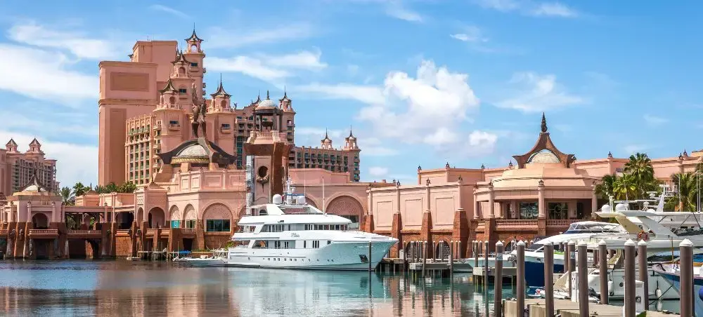 Atlantis Paradise Island resort's pink coral architecture and luxury yacht marina in Nassau, Bahamas