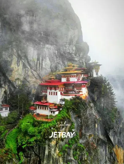 Tiger's Nest Monastery perched dramatically on Paro cliffside in Bhutan with Jetbay branding overlay
