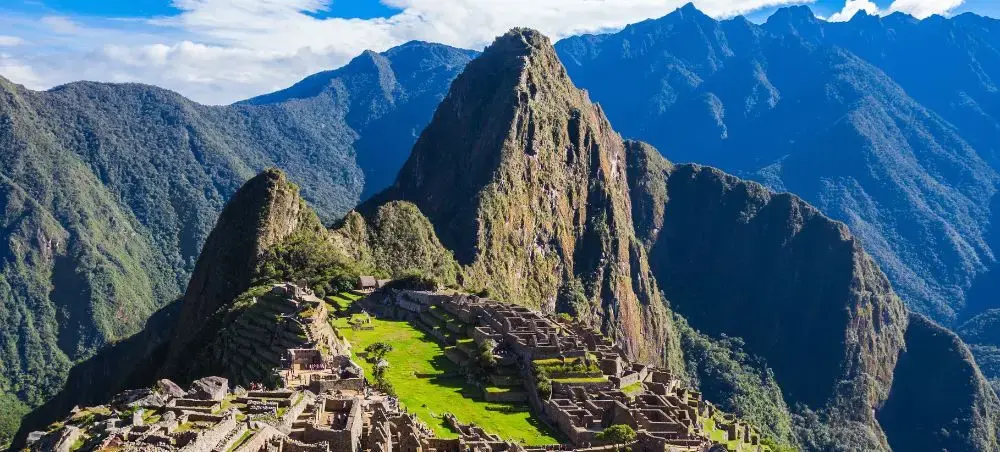 Machu Picchu ancient citadel perched on mountain ridge showcasing Peru's iconic archaeological wonder