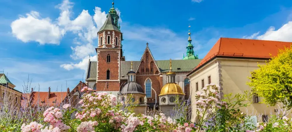 Historic Wawel Cathedral towers and golden dome in Krakow, Poland showcasing medieval architecture