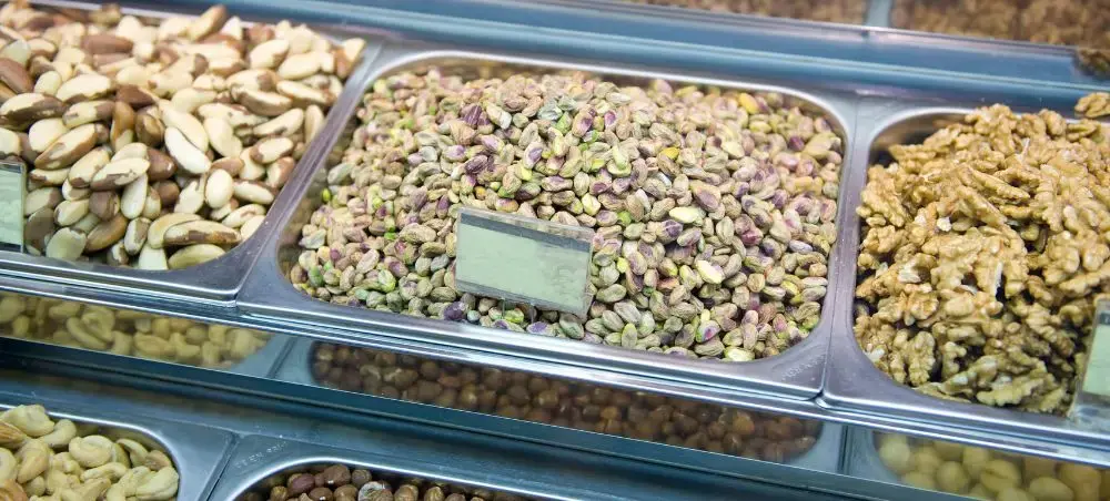 Premium nuts and pistachios displayed at upscale Pretoria market showcasing South African culinary delights