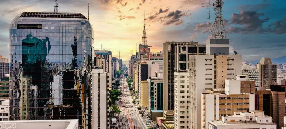Modern São Paulo skyline showcasing Brazil's urban architecture and bustling streets at golden hour