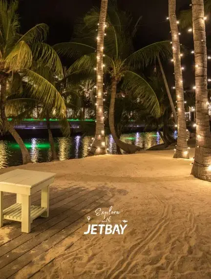 Seven Mile Beach international airport runway and private jet FBO terminal handling charter arrivals