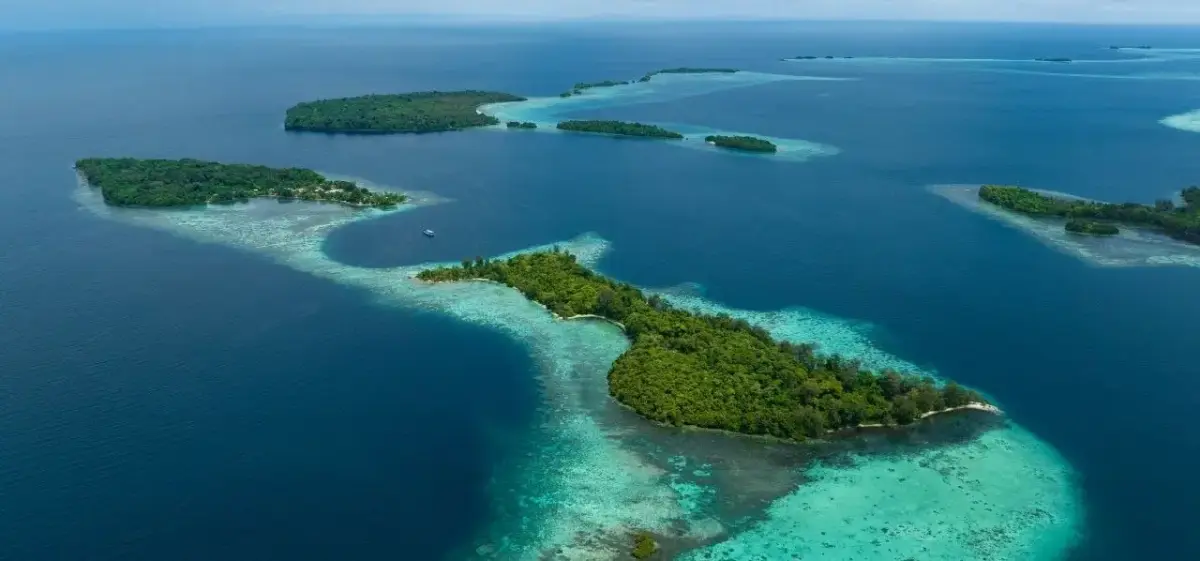 Solomon Islands skyline and waterfront district photographed from a private aircraft on final approach
