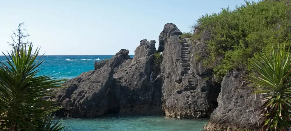 Dramatic limestone cliffs and turquoise waters showcase Southampton's rugged coastline in Bermuda