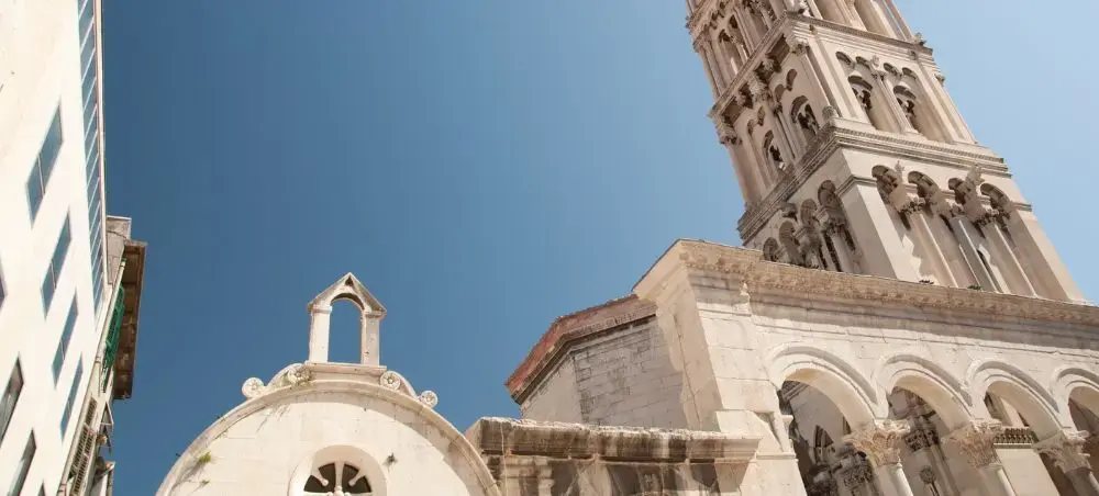 Historic Diocletian's Palace bell tower and ancient stone architecture in Split's old town center