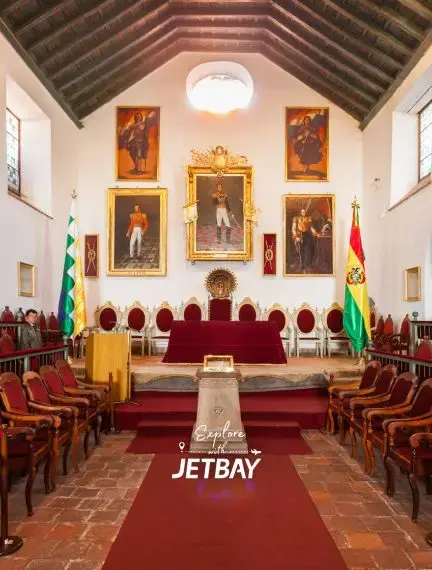 Historic government chamber in Sucre Bolivia featuring colonial architecture and traditional ceremonial decor