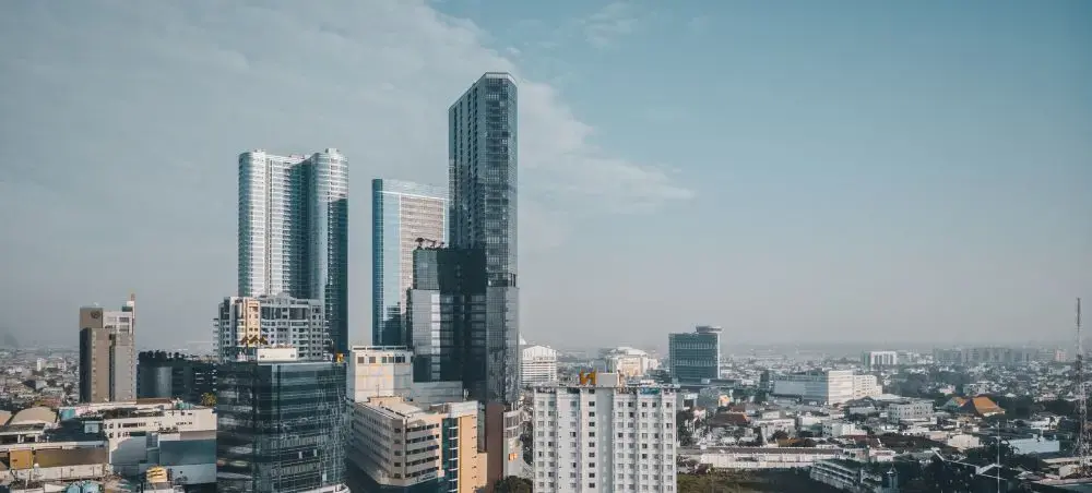 Modern skyscrapers and urban development showcase Surabaya's growing business district and luxury travel appeal