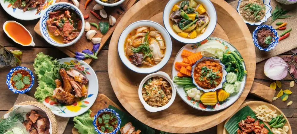 Traditional Thai feast with authentic curries, soups, and dishes showcasing Thailand's rich culinary heritage