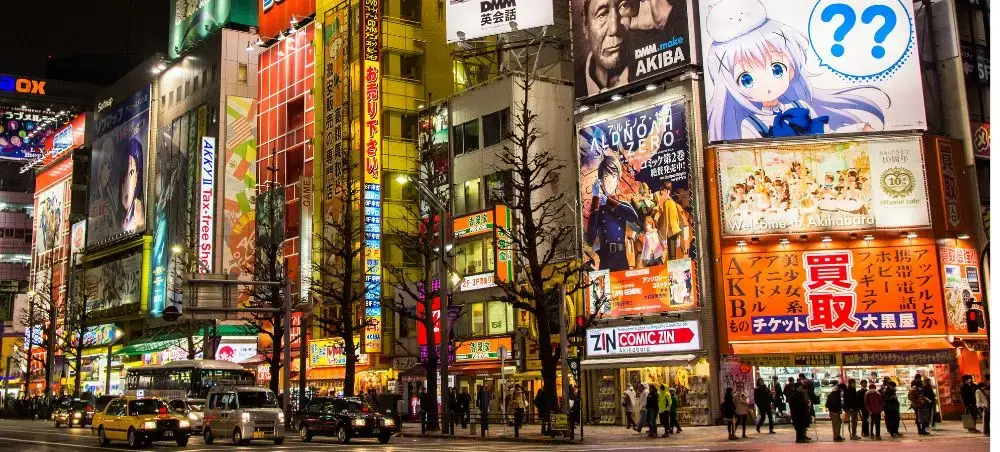 Vibrant neon-lit streets of Tokyo's Akihabara district showcasing Japan's electric urban nightlife scene