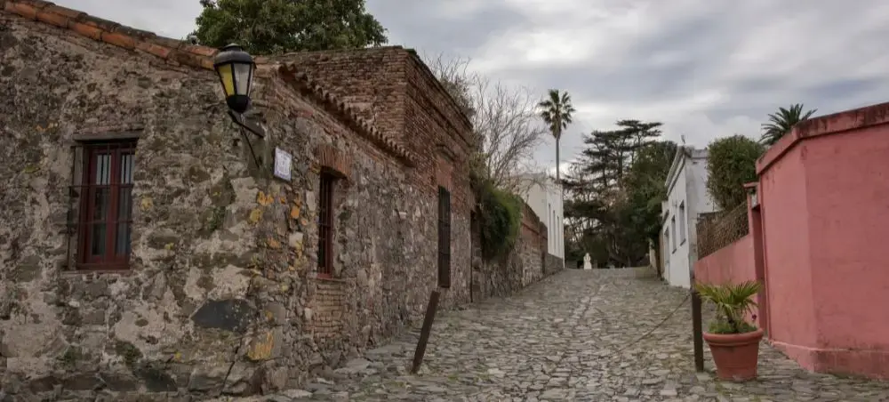 Historic cobblestone street in Colonia del Sacramento showcasing Uruguay's colonial architecture and charm