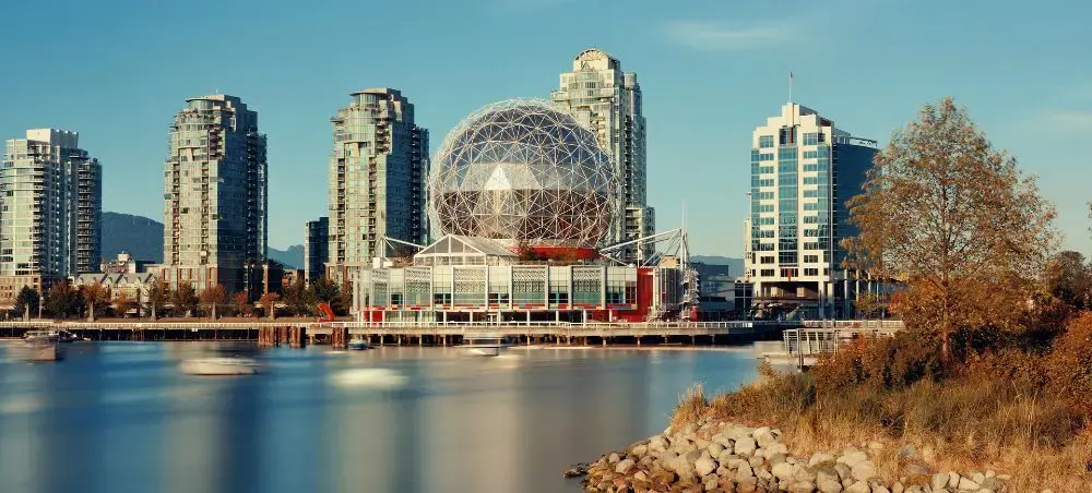 Vancouver waterfront skyline featuring Science World's iconic geodesic dome and modern high-rise towers