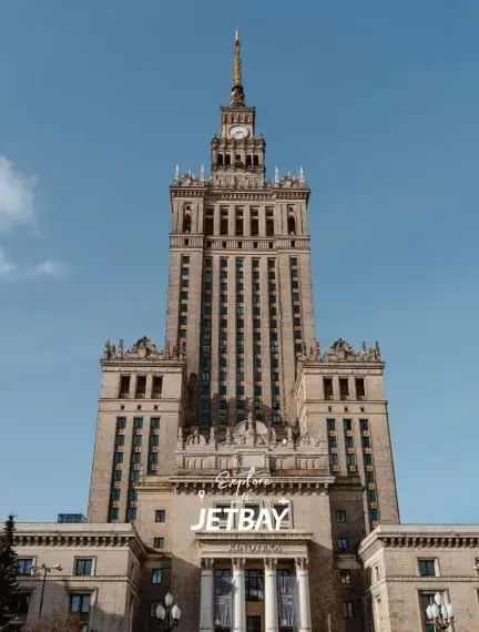 Palace of Culture and Science towering over Warsaw skyline with Jetbay branding visible below