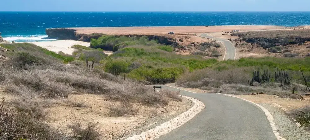 Waterfront promenade and landmark architecture in Arikok National Park for private jet charter visitors