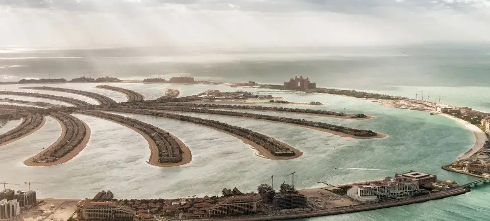 Waterfront promenade and landmark architecture in Dubai for private jet charter visitors