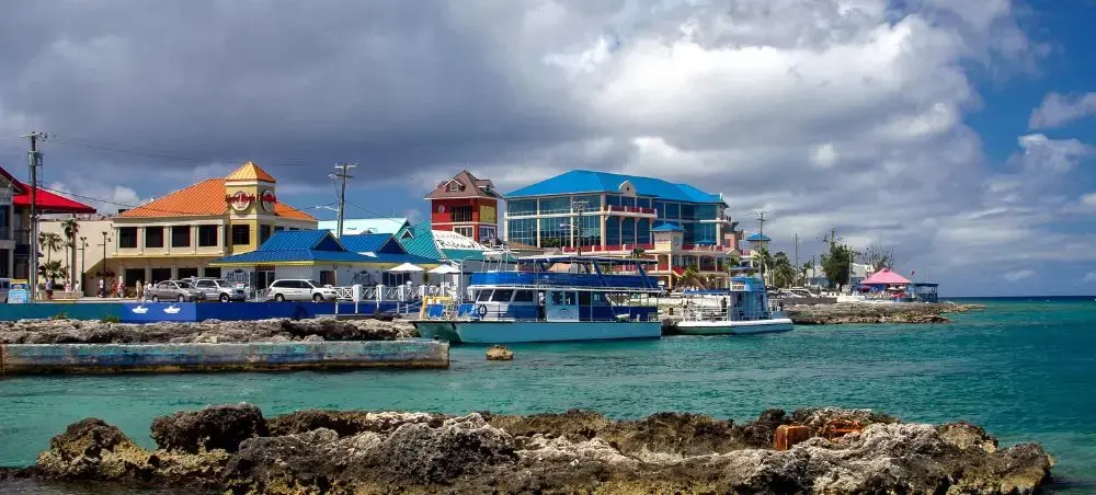 Waterfront promenade and landmark architecture in George Town for private jet charter visitors