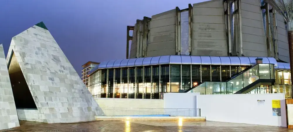 Modern Wellington waterfront architecture featuring contemporary museum and cultural buildings illuminated at dusk
