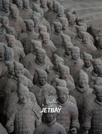 Ancient terracotta warriors standing in formation at Xi'an archaeological site, China's historic destination