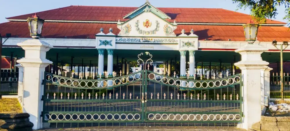 Ornate gates and traditional Javanese architecture of Yogyakarta's Sultan Palace complex entrance