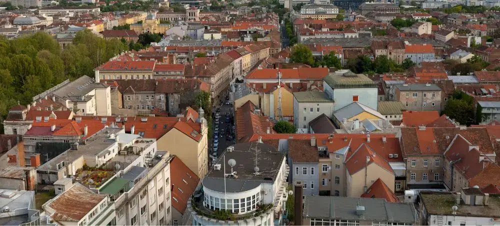 Aerial view of Zagreb's historic city center showcasing red-tiled roofs and charming European architecture