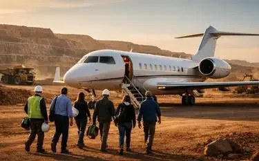 Business team walking toward luxury private jet on remote desert airstrip for personnel transport mission