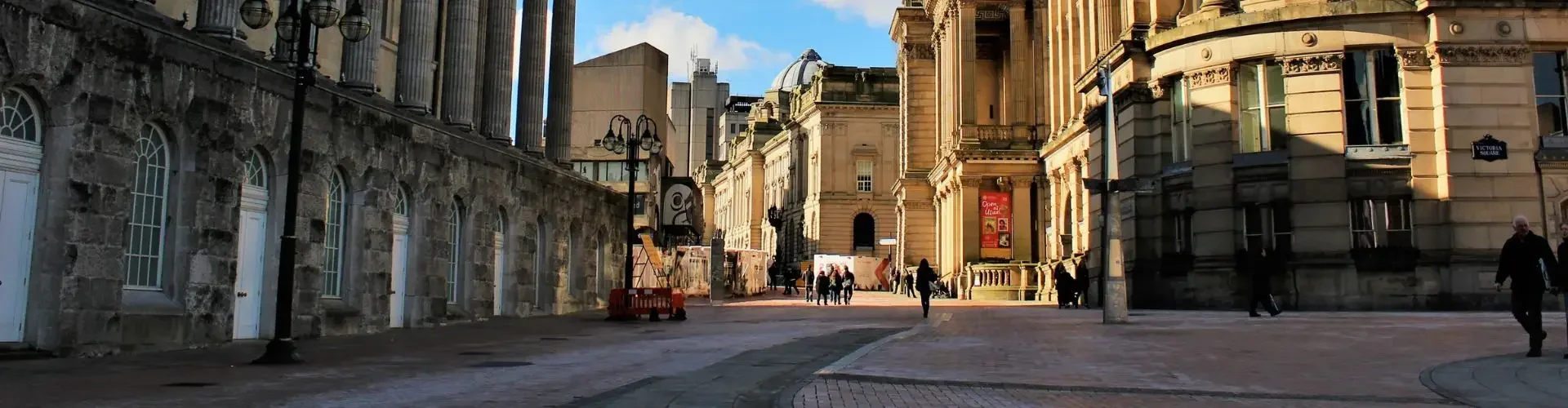 Birmingham city center neoclassical architecture clock tower luxury private jet travel