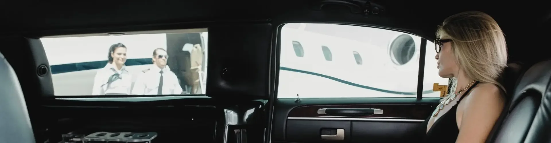 Charter Process: How to Book a Private Jet in Canada Elegant woman relaxing in luxurious private jet cabin interior during Canadian charter flight
