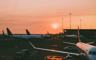 Formula 1 grand prix travel — private jet nose and cockpit windows on the tarmac